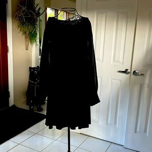 Black dress below knee sheer long sleeve elastic wrist cuff